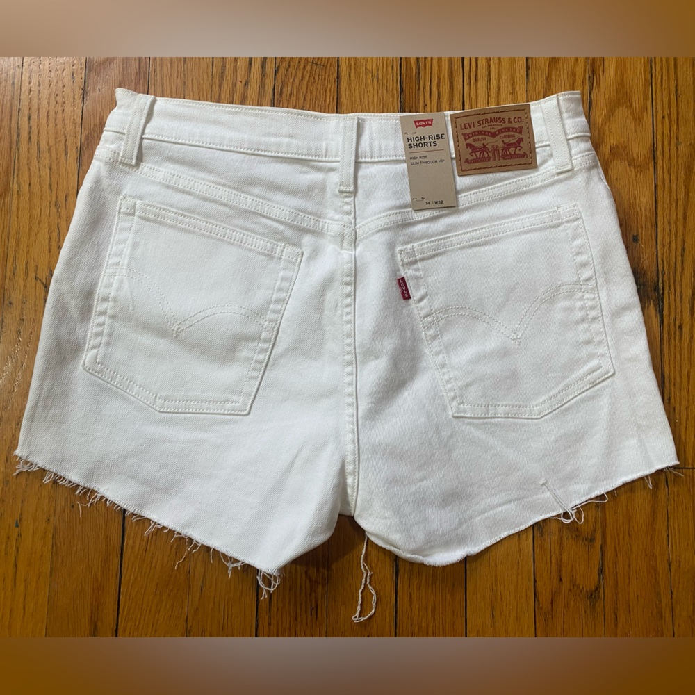 Levi’s: High-rise, white shorts— 97% cotton